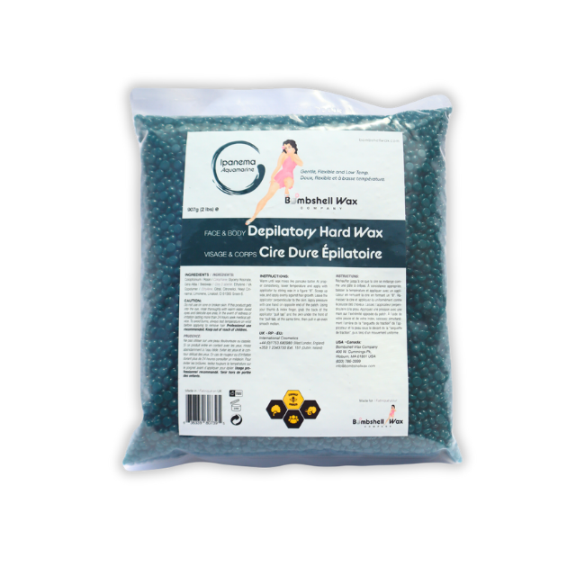 Close-Up of Aquamarine Hard Wax Beads Melting in Wax Pot