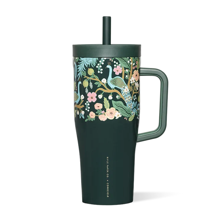 Dark green tumbler with floral and peacock design on a white background