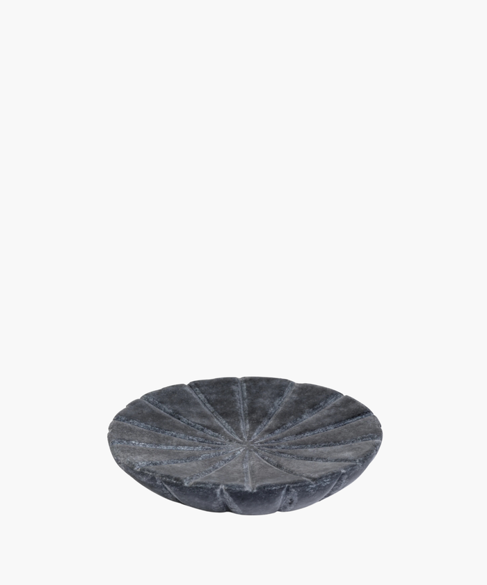 A round, textured gray stone bowl with a segmented, flower-like design on its surface. The bowl has a modern, minimalist aesthetic, conveying elegance. | SW Home