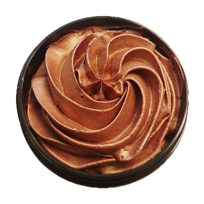 Rich bronze cream highlighter with swirled texture in black jar, organic skin care