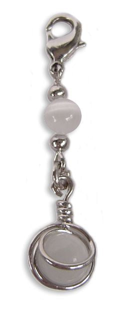 White bead hair charm with silver metal wrap and clasp on white background