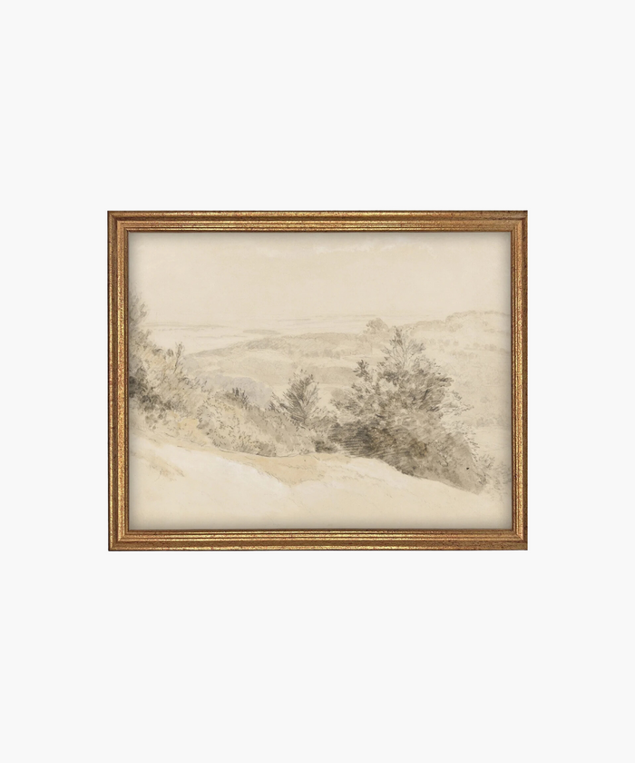 A sepia-toned landscape drawing depicts rolling hills and trees, exuding a serene, nostalgic atmosphere. Framed in an antique golden frame. | Wildwood Home Co.