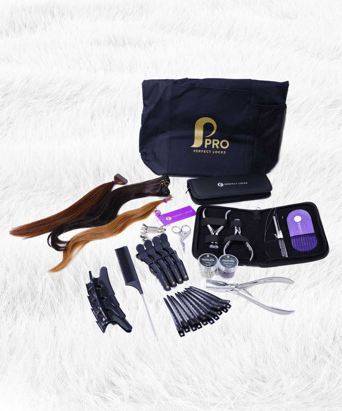 A hair extension starter kit on white fur with a black bag, extensions, clips, scissors, comb, pliers, thread, and tools.