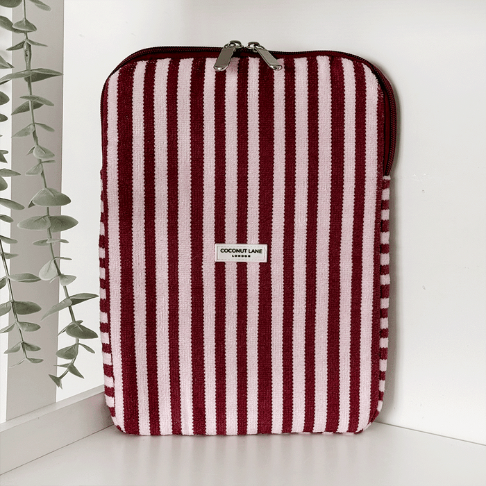 Burgundy and light pink striped iPad Sleeve, with silver zip and Coconut Lane logo badge.