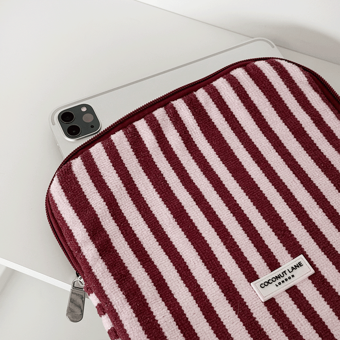 Burgundy and light pink striped iPad Sleeve, with silver zip and Coconut Lane logo badge.
