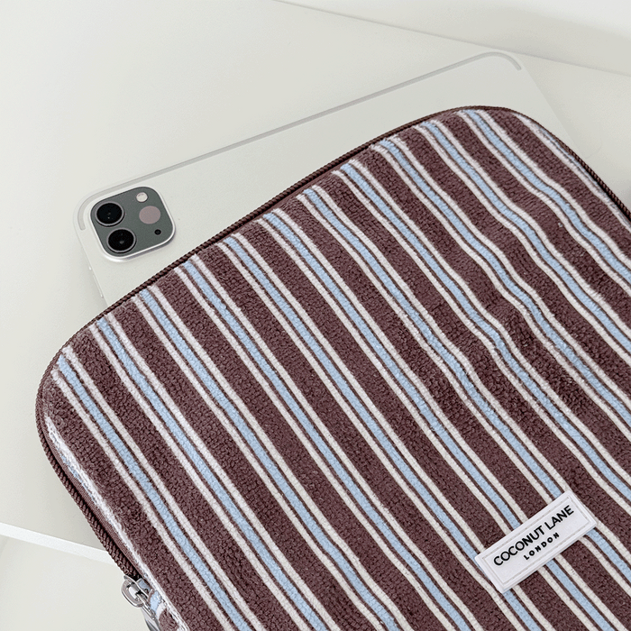 Brown, white and blue striped iPad Sleeve with silver zip and Coconut Lane logo badge.