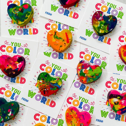 9 colorful heart crayons, each on white "You Color My World" printable valentines for classmates.