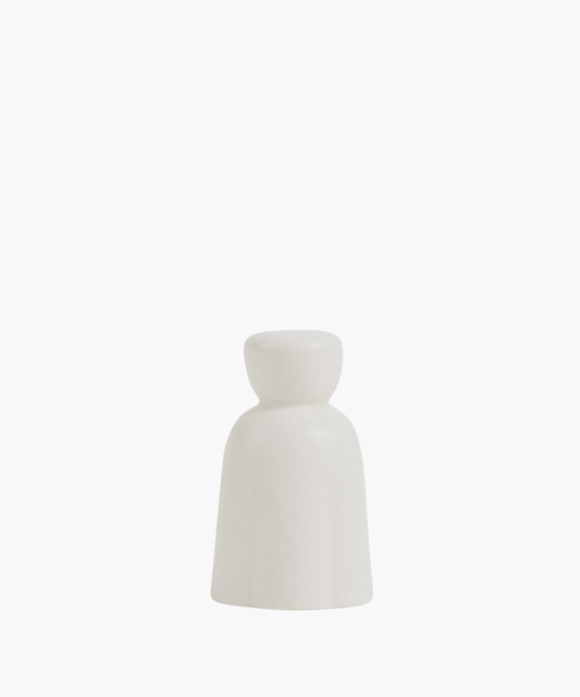 Simple, white ceramic bell-shaped candle snuffer with a smooth texture, set against a white background. Minimalist design evokes a sense of calm and modernity. | SW Home