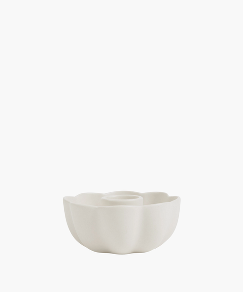 A smooth, matte white candle holder in floral shape. | SW Home