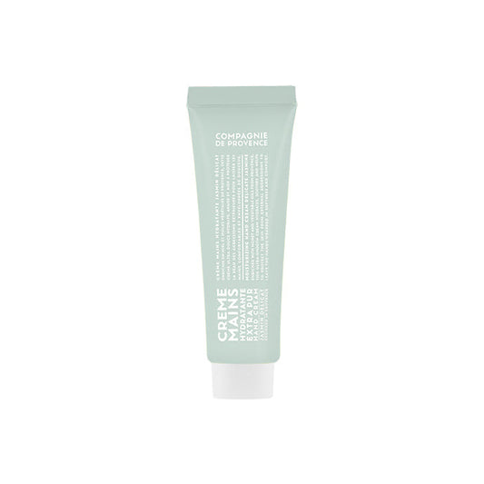 A tube of Compagnie de Provence hand cream with a soft jasmine fragrance, predominantly green in color with product details in white text.