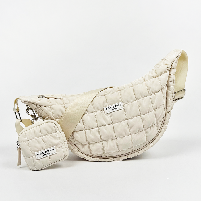 Cloud Crossbody Crescent Dog Walking Bag Bundle in light grey with wide strap, matching pouch, and poop bag dispenser.