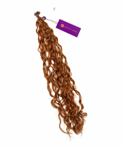 A bundle of long, curly Golden Brown  Remy hair extensions from Perfect Locks, labeled "Curly Fusion I-Tip Hair," with a purple tag near the top.#color_golden-brown-(6)