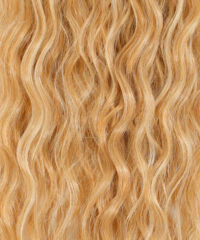 Close-up of long, wavy Chocolate Brown hair with shiny texture. Hand-tied extensions blend, matching loose waves for a flawless look.#color_caramel-blonde-highlights-(24/27/613)