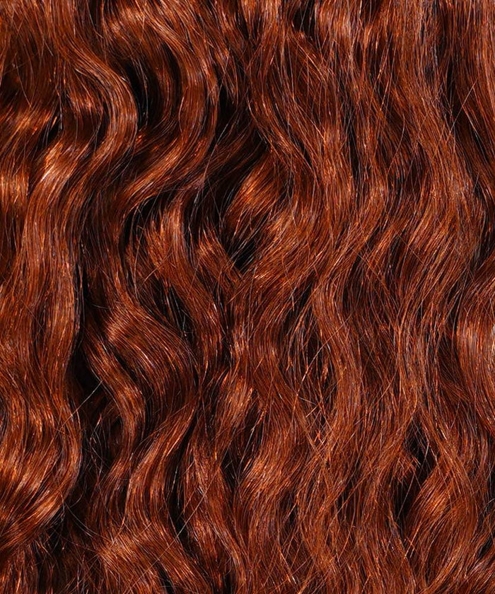 A close-up of Perfect Locks Curly Hand-Tied Weft Rows (2oz) in Honey Blonde , showcasing shiny curls, soft texture, and vibrant golden hues.#color_dark-auburn-(33)