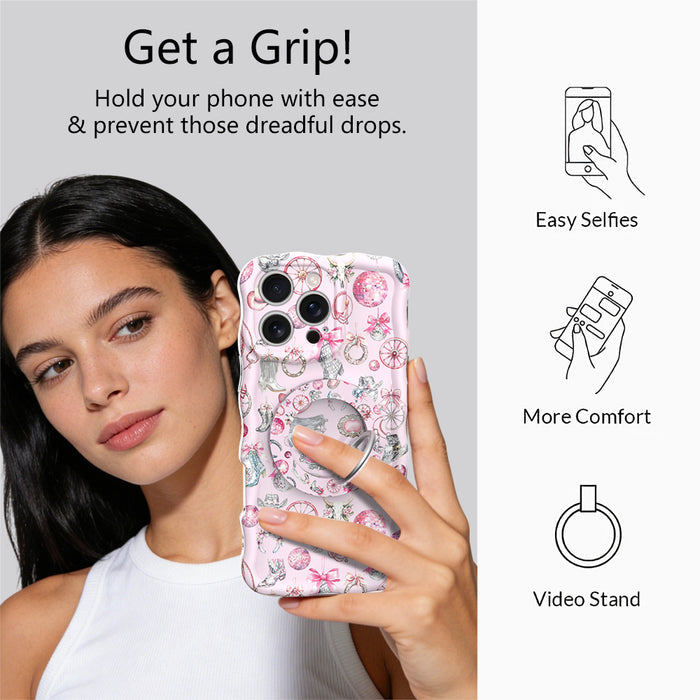 Disco Cowgirl phone grip ring with pink disco balls, cowboy boots, ribbons, and horseshoes on a light pink background compatible with iPhone and Samsung