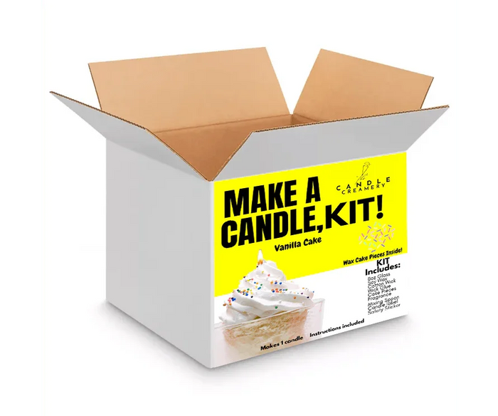 Vanilla cake DIY candle making kit in open box with bright yellow label and whipped cream design
