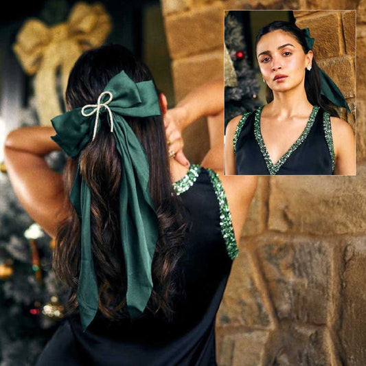 Dark green Alia bow hair accessory with subtle sparkle, perfect for parties and evening looks