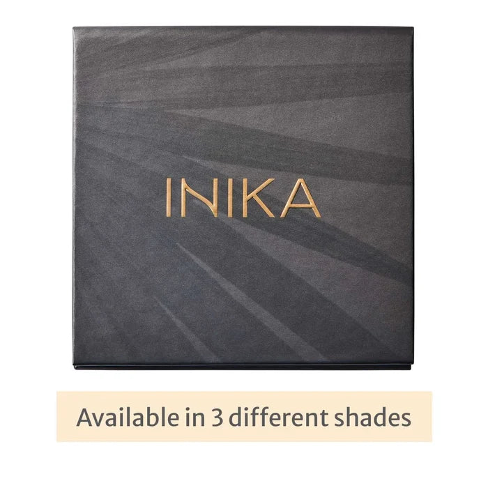 INIKA product packaging with gold text on a dark background. Available in 3 different shade ranges.