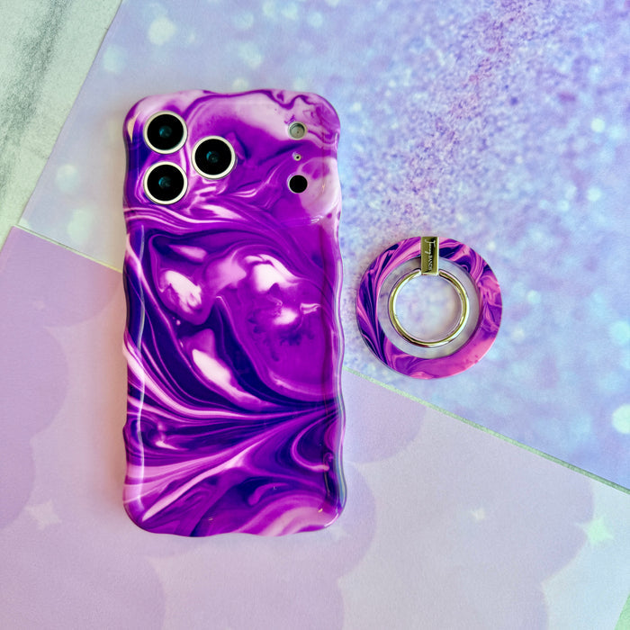 Grape Crush MagSafe grip ring shown beside the matching Grape Crush iPhone case, showing the glossy purple and white marbled swirl print.