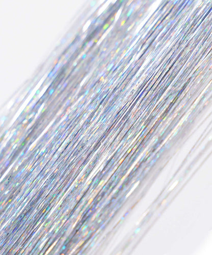 Perfect Locks’ Perfect Hair Tinsel in Shiny Black has thin, reflective strands that add a stunning shimmer and subtle shine to hair.#color_silver