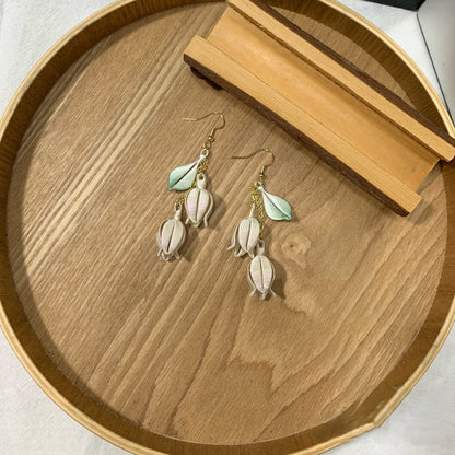 Handmade Chanhua lily of the valley earrings with thread bell flowers and green leaves, dangling floral drop earrings