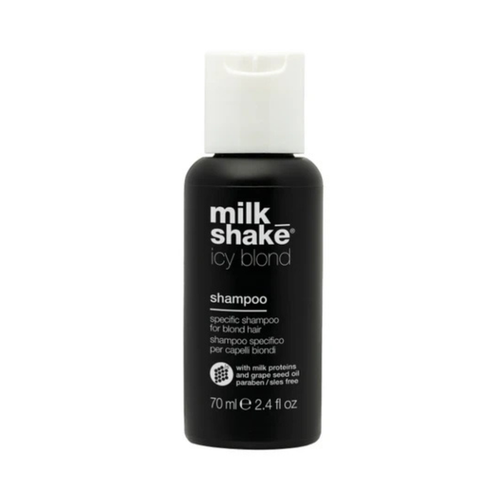 Black shampoo bottle with white cap labeled 'milk shake icy blond' on a white background