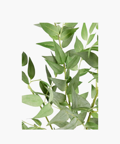 Artificial green leaves on a white background. | SW Home