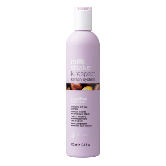 Purple shampoo bottle with 'milk shake' branding on a white background