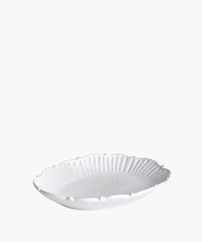 Small white ceramic catchall tray with a decorative rim. | SW Home