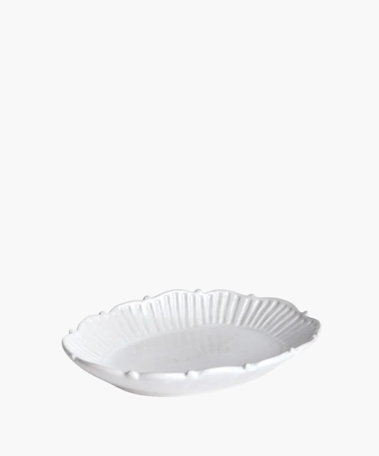 Small white ceramic catchall tray with a decorative rim. | SW Home