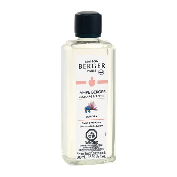 A 500ml Maison Berger fragrance diffuser refill bottle with floral design and black cap.