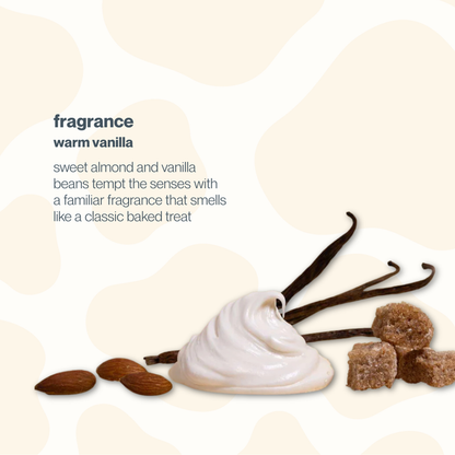 Advertisement for a warm vanilla fragrance with vanilla beans, almond, and brown sugar on a beige background.