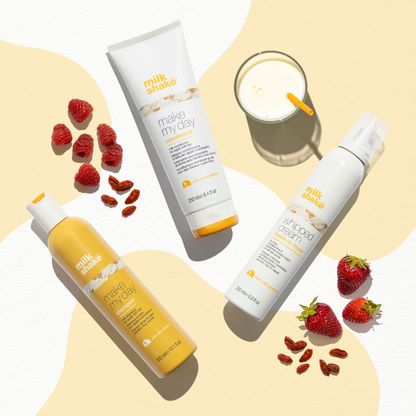 milk_shake skincare products with strawberries and a glass of milk on a light background