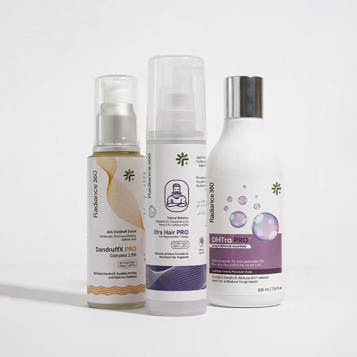 Three skincare products on a white background
