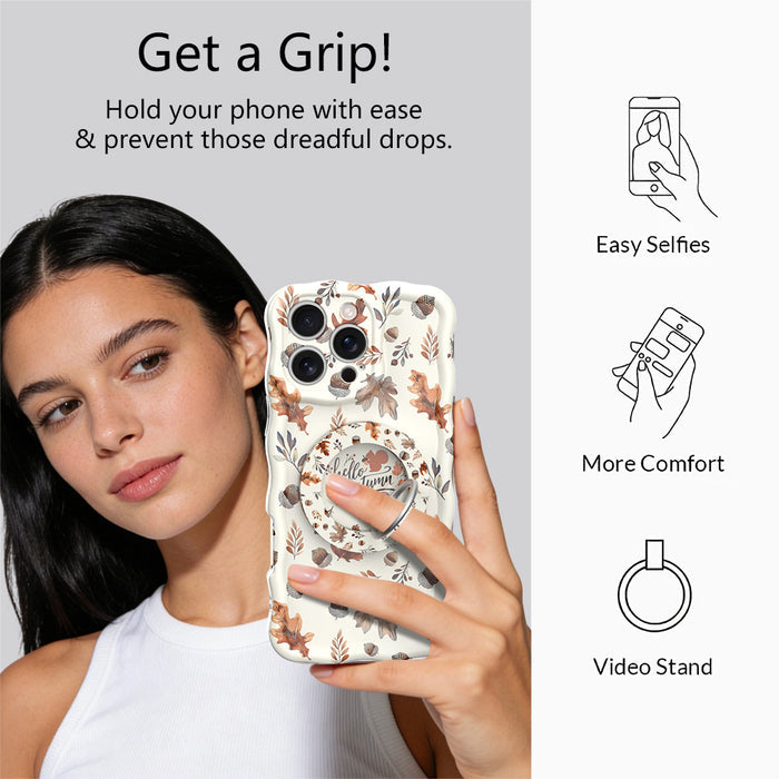 Get a Grip infographic for the Nutty For Fall MagSafe grip ring, showing a model holding her cream acorn print phone one-handed plus easy selfies, added comfort, and video stand uses.