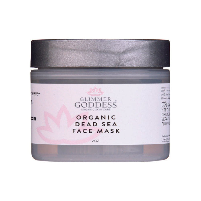 Glimmer Goddess Organic Dead Sea Face Mask in clear jar with black lid, featuring pink lotus design