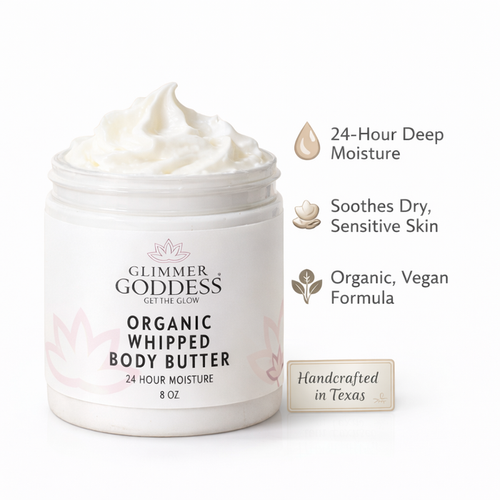 Organic whipped body butter by Glimmer Goddess for extremely dry skin, showing a smooth, creamy texture in a jar.