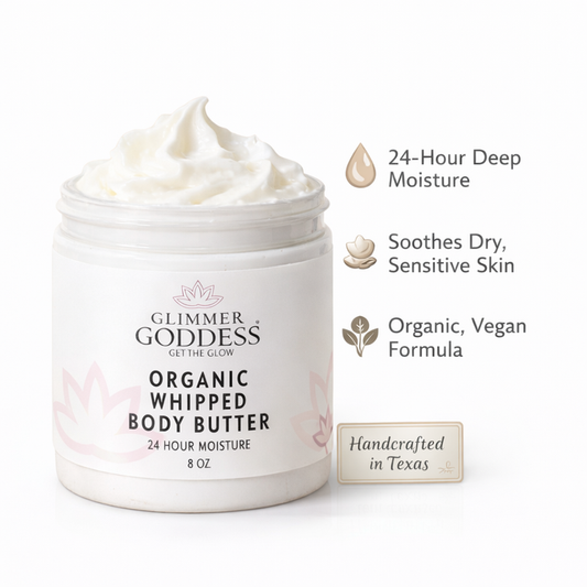 Organic whipped body butter by Glimmer Goddess for extremely dry skin, showing a smooth, creamy texture in a jar.