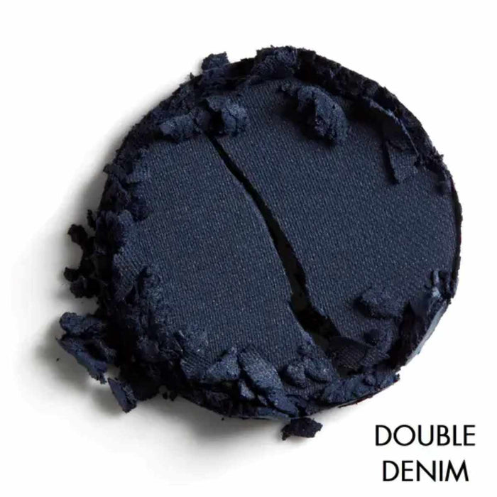 Navy blue makeup shade with textured edges on a white background, labeled 'Double Denim'.