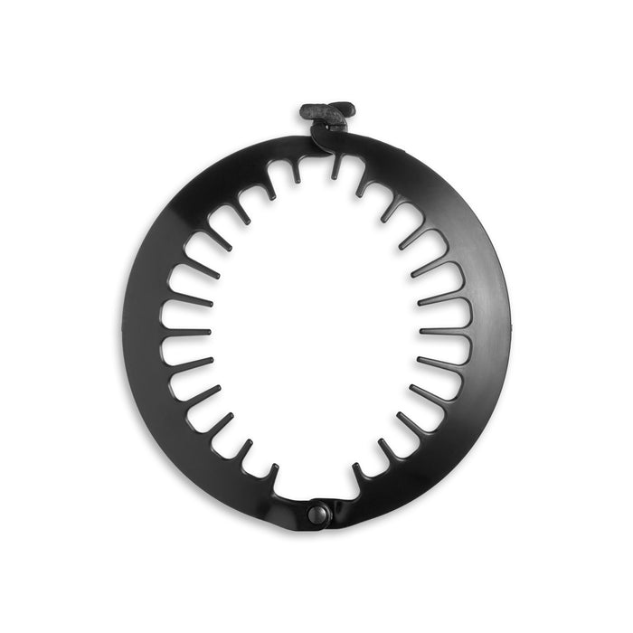 Black metal ring with cut-out design on a white background