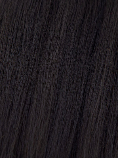 Close-up of smooth, dark brown or black hair strands, highlighting the texture and healthy, natural shine.