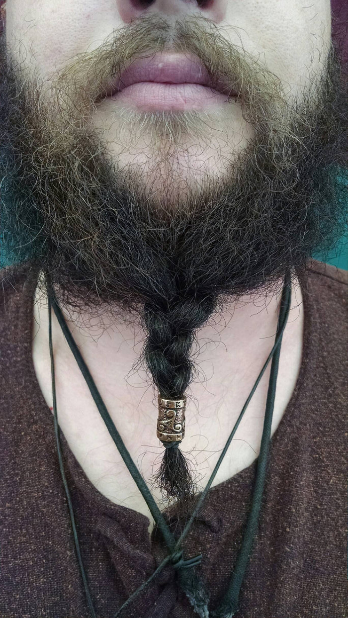 Model wearing Rune Spiral Hair Bead - Gold Finish Viking Celtic Braid Accessory