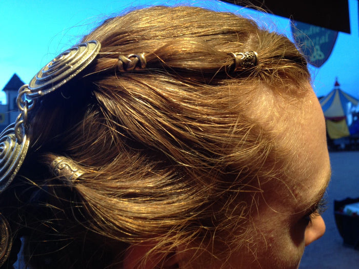 Model wearing Rune Spiral Hair Bead - Gold Finish Viking Celtic Braid Accessory