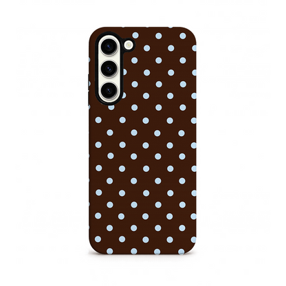 Phone case with white polka dots on a brown background