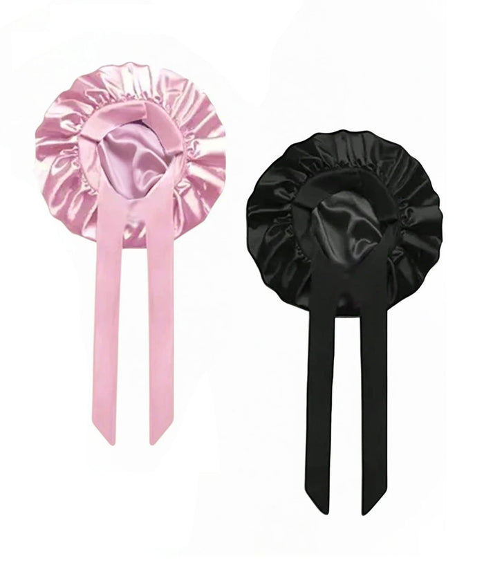 A stylish pink and black ribbon, perfect for crafts or gifts.