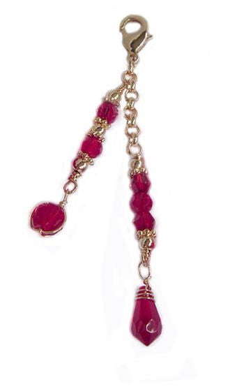 Small gold 2-strand hair charm with red beads and lobster clasp