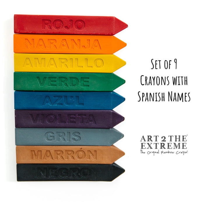 9 solid colored crayons on a white background. Rojo, naranja, Amarillo, verde, Azul, Violeta, gris, marron, and negro are engraved on each crayon to learn the Spanish colors.