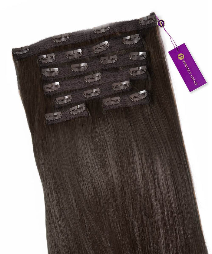 A set of Straight Classic Clip-In Hair Extensions by Perfect Locks in Natural Black , with clips at the top and a purple tag attached.#color_natural-black-(1B)