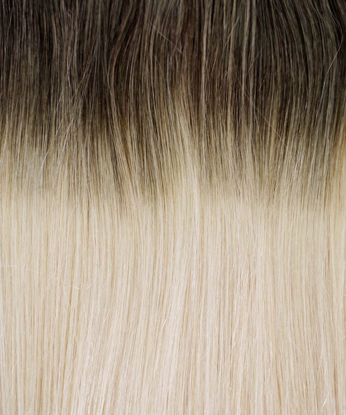 A close up of hair enhanced with Perfect Locks Straight Classic Clip-In Hair Extensions in Chocolate Brown .#color_ashy-brown-balayage-(3/60)