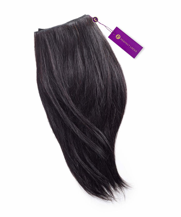 A bundle of Perfect Locks Straight Virgin Machine Weft hair extensions in Natural Black  with a purple tag on a white background.